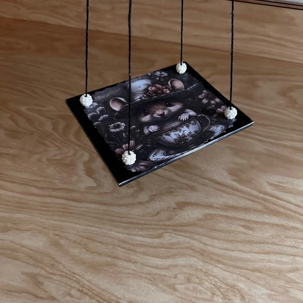 Handmade hanging display shelf with vintage mouse and teacup art